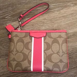 Pink and Tan Coach Wristlet